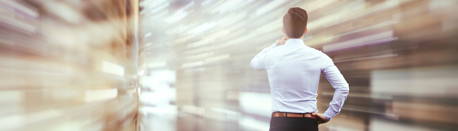 Business man observing fast speed dataflow